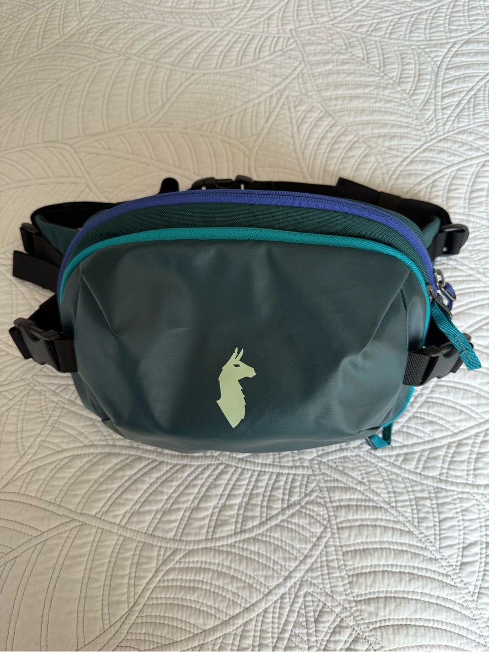 cotopaxi Dark Teal Belt Bag with Teal and Purple Zippers